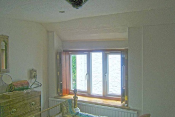 03-made-to-measure-trifold-front-bedroom-shutters-sapele-wood